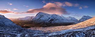 snow-covered mountain under blue sky, glencoe, scotland