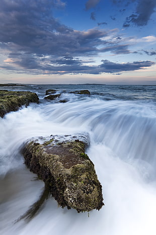 body of water beside rock mountain under blue cloudy sky during daytime, cronulla