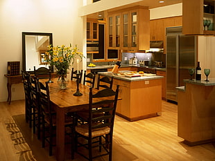 rectangular brown wooden table with eight chairs dining set