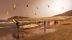 brown and black metal frame, photography, kite surfing