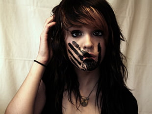 photo of a woman with black hand print on her face HD wallpaper