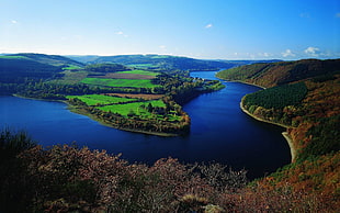 mountain near body of water