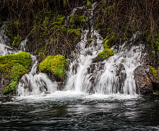 time lapse photography of waterfalls