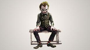 The Joker sitting on bench photo HD wallpaper