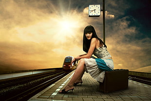 woman wearing white 2-piece dress sitting on train station at 5:44 HD wallpaper