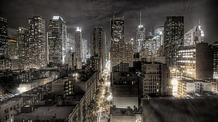 high rise buildings at nighttime HD wallpaper