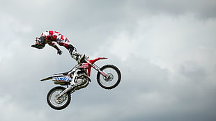 red and black motocross dirt bike, motocross, stunts HD wallpaper