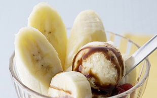 sliced of banana with ice cream in clear glass bowl HD wallpaper
