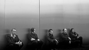 five men sits and leans on wall HD wallpaper