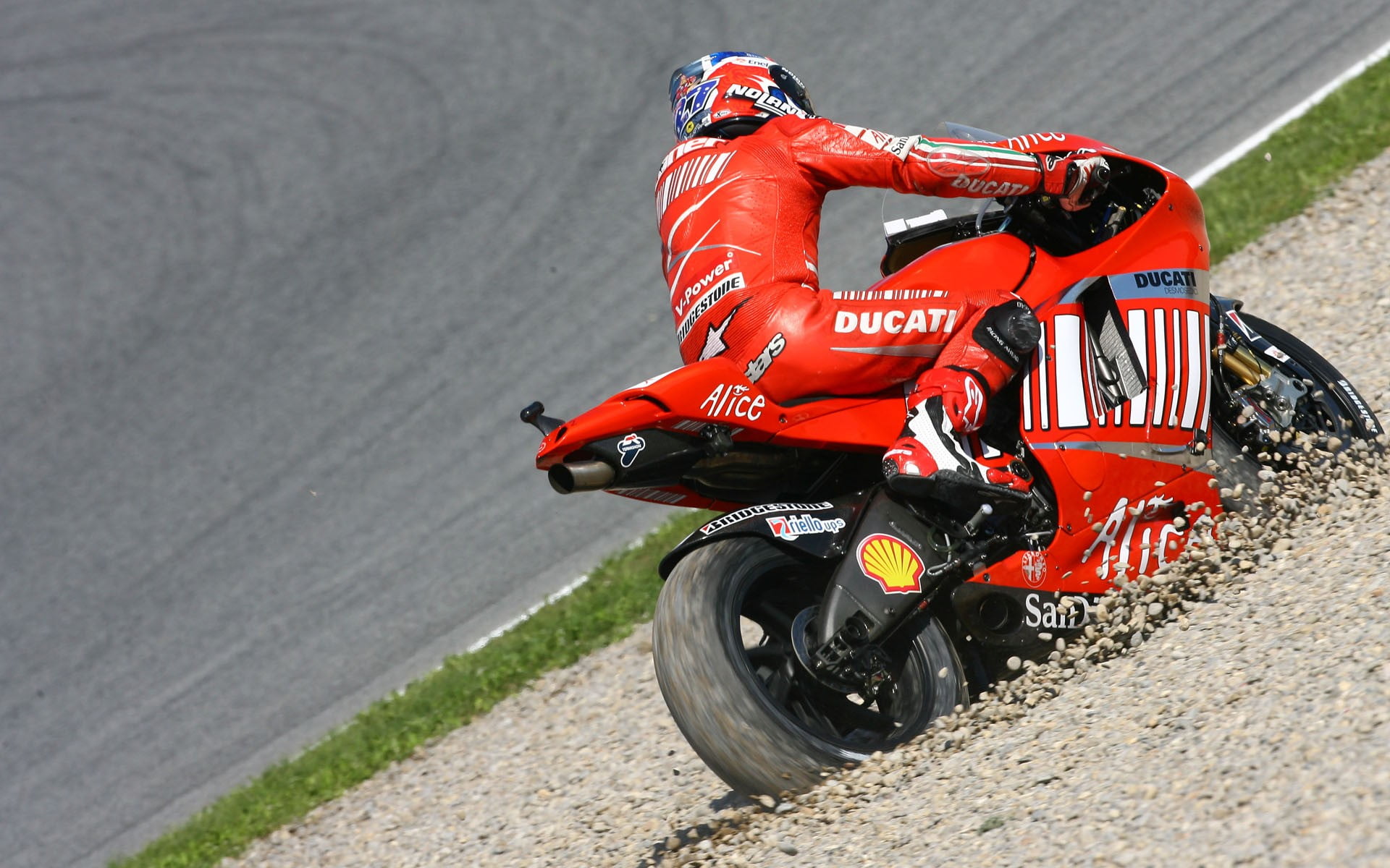 Person riding on red Ducati sports bike, Moto GP, Casey Stoner, Ducati,  racing HD wallpaper | Wallpaper Flare