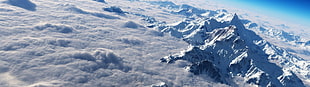 mountain covered with white snow during daytime aerial photography