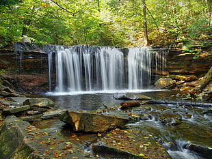 time lapse photography of waterfalls