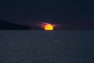 blue ocean in sunset scene HD wallpaper