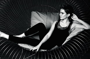 woman lying on black sofa HD wallpaper