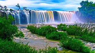 waterfalls near green grass plant at daytime HD wallpaper