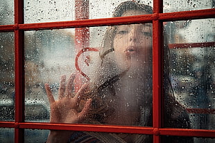 women blower on glass window with heart decor HD wallpaper