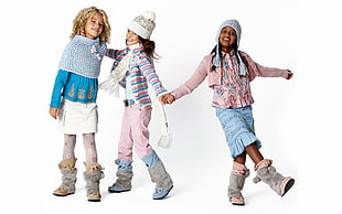 three girls wearing winter suit