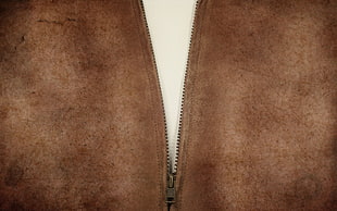 closeup photo of brown leather zip apparel
