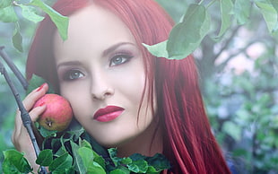 red haired woman holding a red apple HD wallpaper
