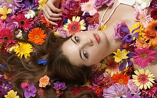 photography of a woman in bed of flowers HD wallpaper
