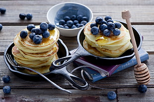 two black steel frying pans with blue berry pancakes HD wallpaper