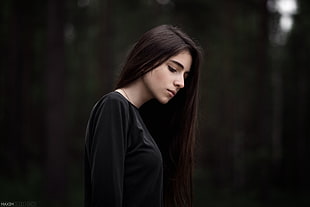 black-haired woman wearing black top