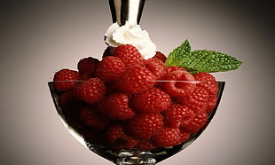 red and white ceramic flower decor, raspberries, food