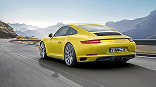 yellow Porsche sports car