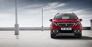 red Peugeot SUV on road during daytime HD wallpaper