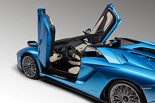 blue convertible sports coupe digital wallpaper