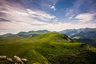 green mountain ranges under cloudy blue sky HD wallpaper