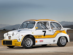 white and yellow FIAT Abarth car during daytime HD wallpaper