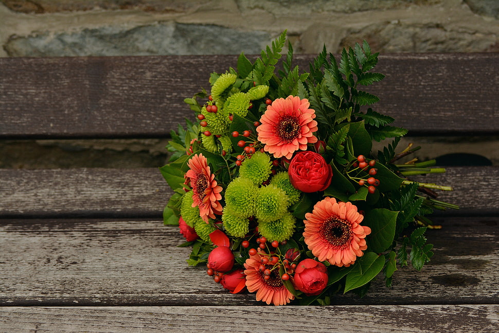 red flower and green leaves bouquet HD wallpaper