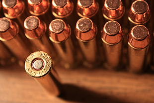brass-colored bullet lot, weapon, bullet, magnum, ammunition HD wallpaper