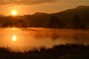 landscape photo of mountain silhouette during sunset