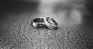 Close-up of Wedding Rings on Floor