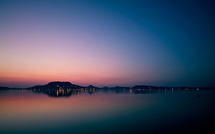 silhouette of mountains by the water at sunset photography, nature, landscape, sky, sea HD wallpaper