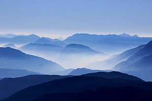 photo of Summit with fog during daylight