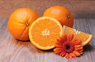 sliced orange fruit HD wallpaper