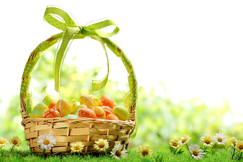 brown wicker basket with assorted-color eggs HD wallpaper