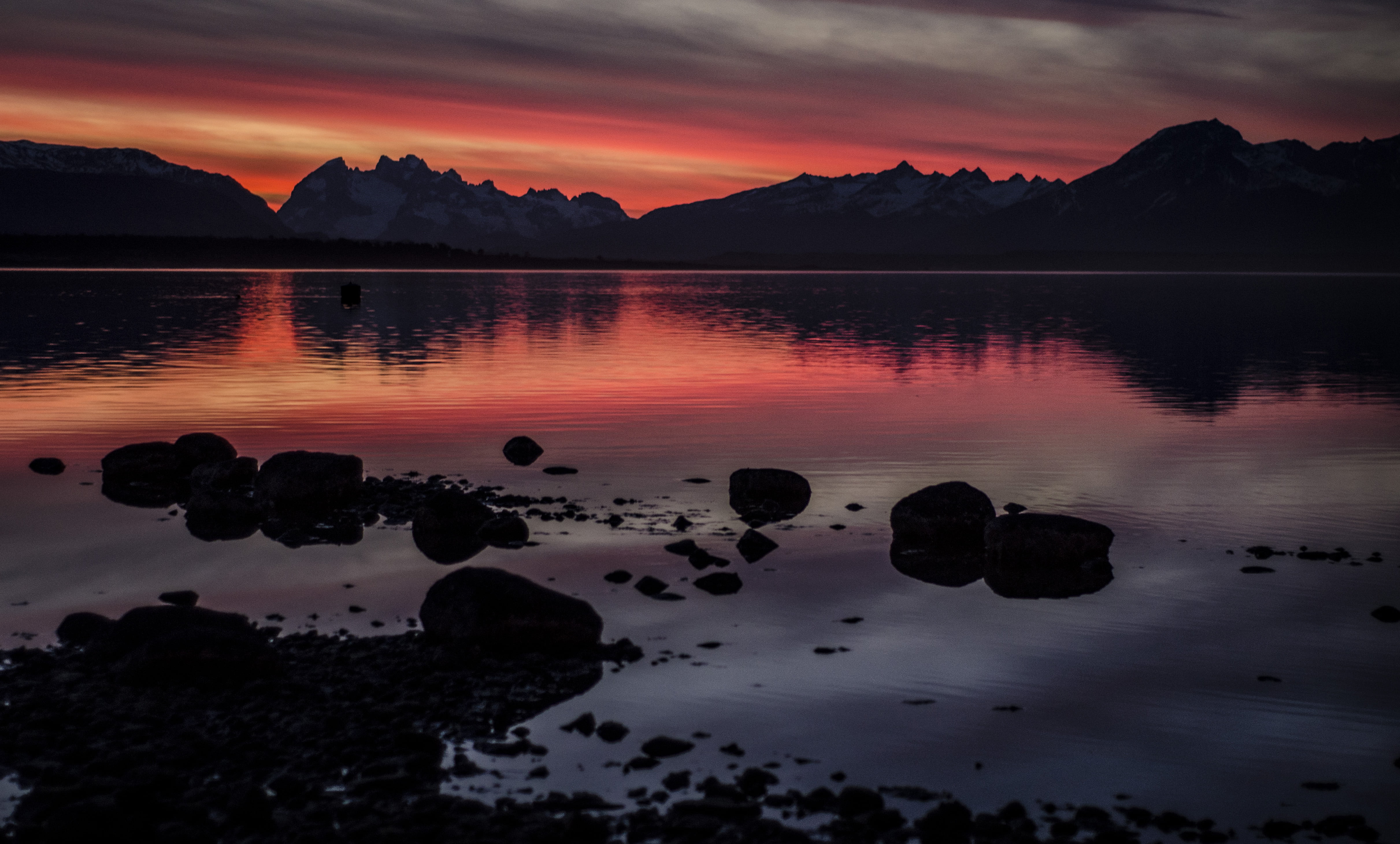 photography of body of water during sunset