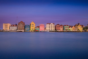 photo of multicolored building surrounded by body of water, willemstad, curacao HD wallpaper