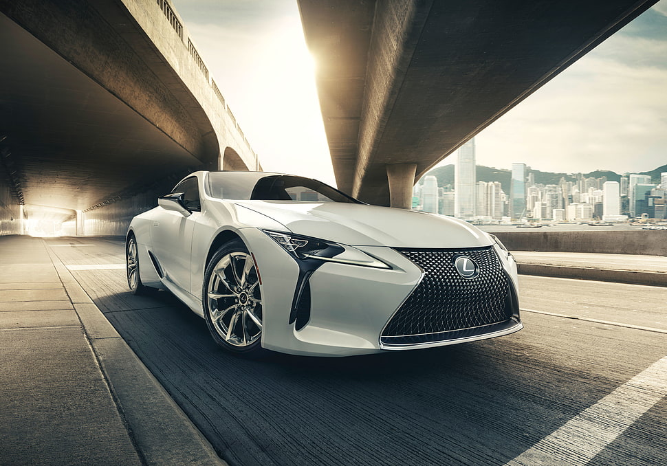 white Lexus sports coupe concept under bridge during daytime HD wallpaper