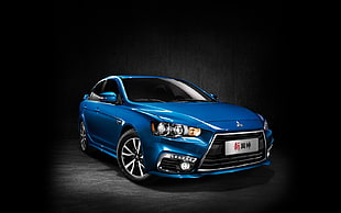 blue Mitsubishi sedan HD wallpaper