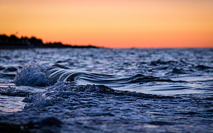 tilt shift photography of sea wave HD wallpaper