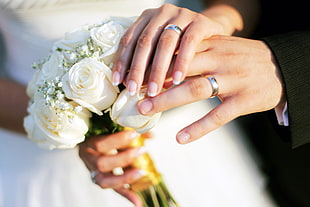 photo of wedding couple holding hands