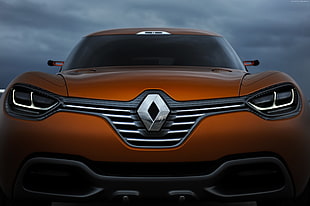 orange Renault sports car HD wallpaper
