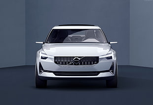 white Volvo car on black floor HD wallpaper