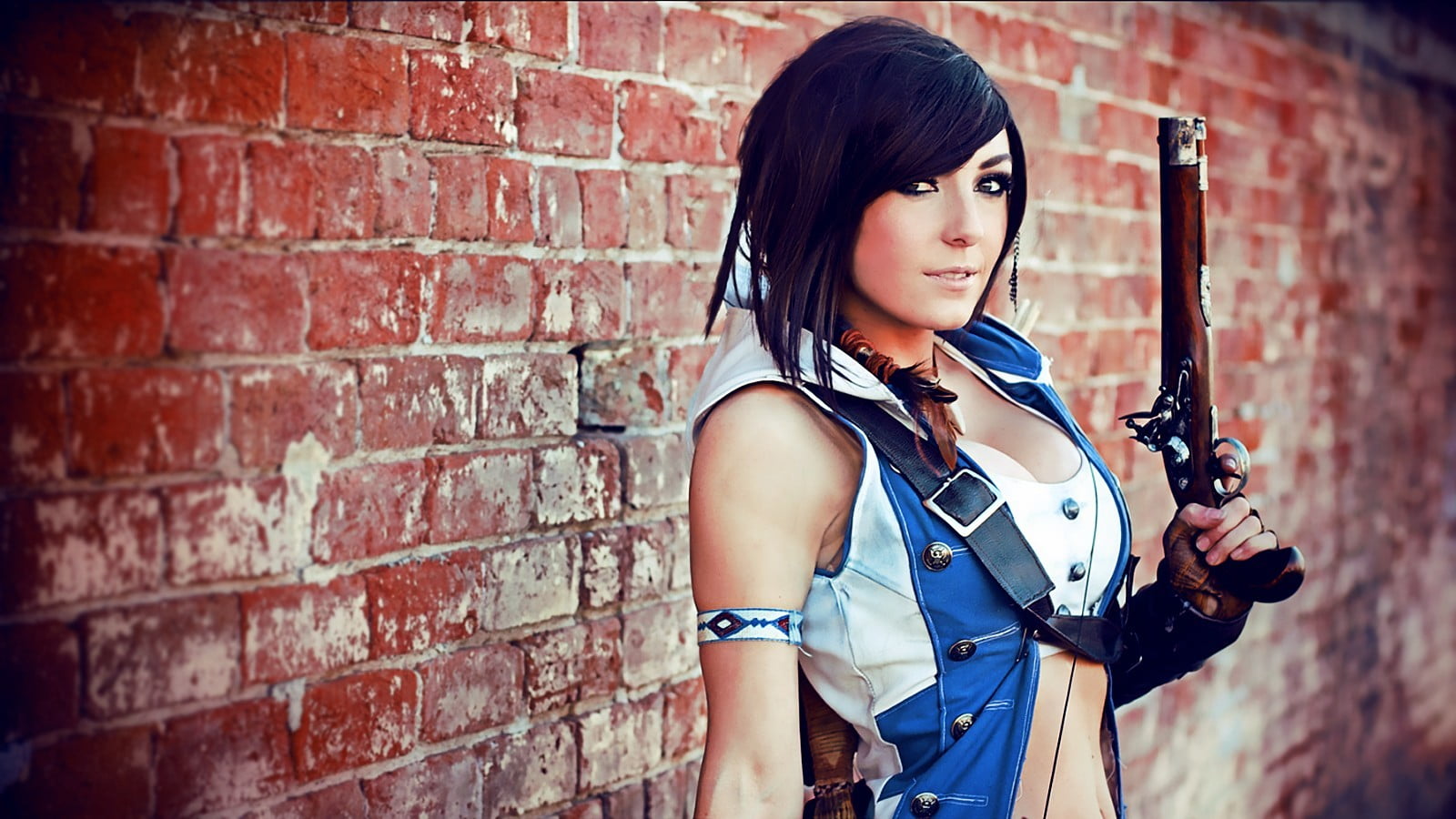 woman wearing blue and white sleeveless hoodie vest