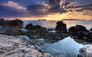 rock formation and body of water